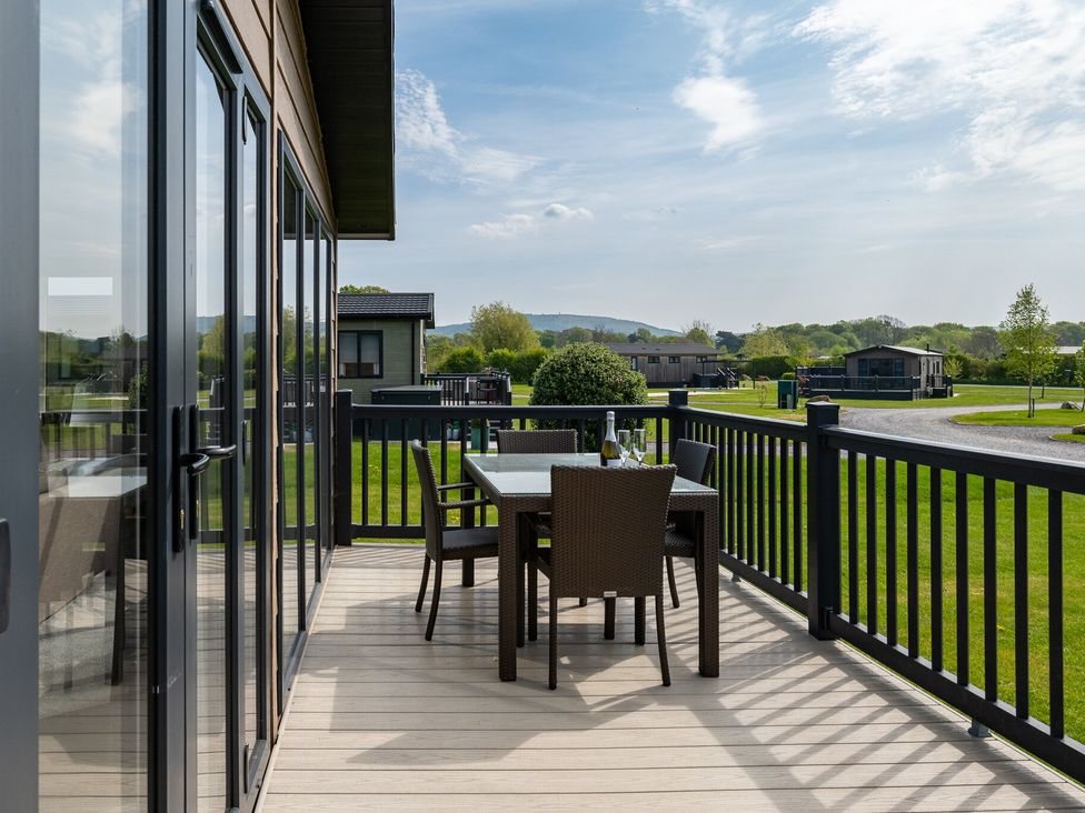 An outdoor area with table and chairs at Greystone in Great Ayton