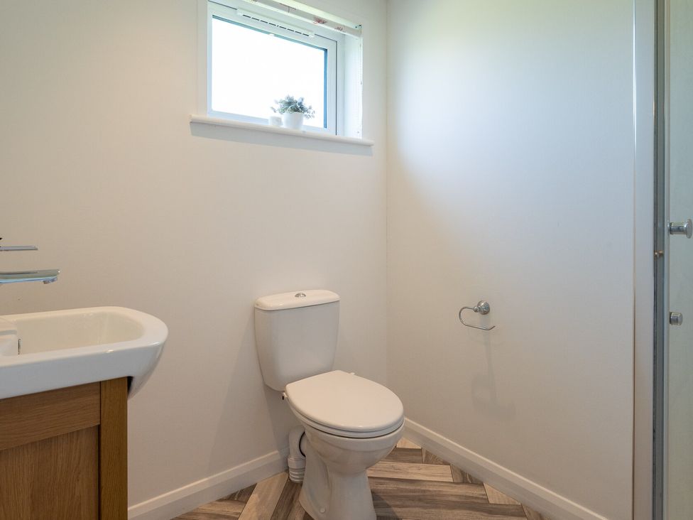 A bathroom with a toilet and sink at Greystone in Great Ayton