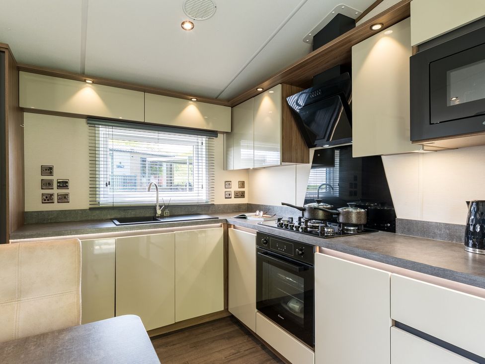 A kitchen with a sink and appliances at The Woods (Pet) Great Ayton