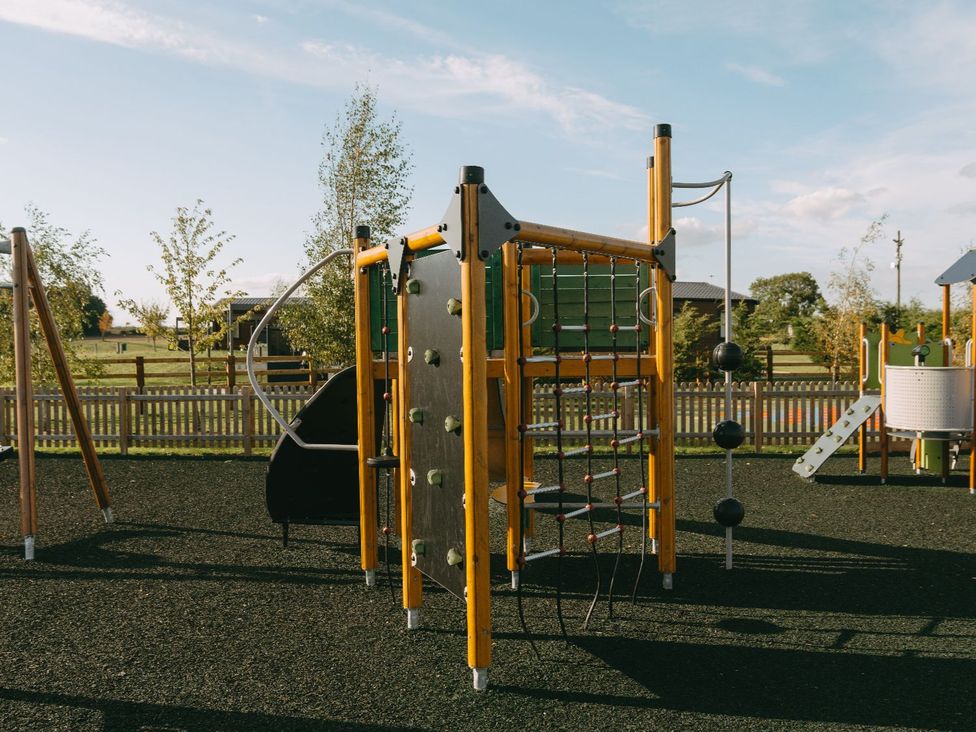 A playground with climbing frame and slide at Roseberry (Pet) Great Ayton