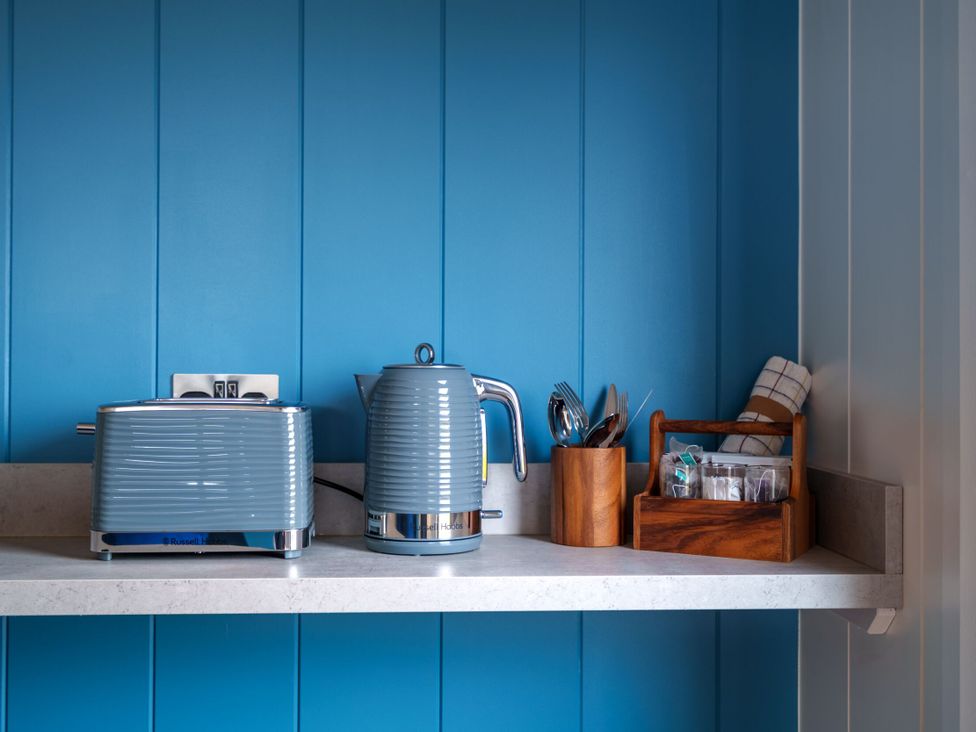 A kitchen counter with a toaster and kettle at The Grays in North Berwick