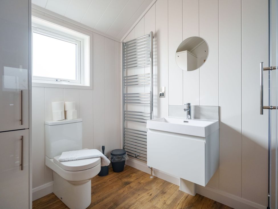 A bathroom with a toilet and sink at The Grays in North Berwick