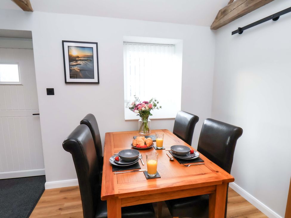 A dining room with a table set for breakfast at The Homestead in Moorsholm