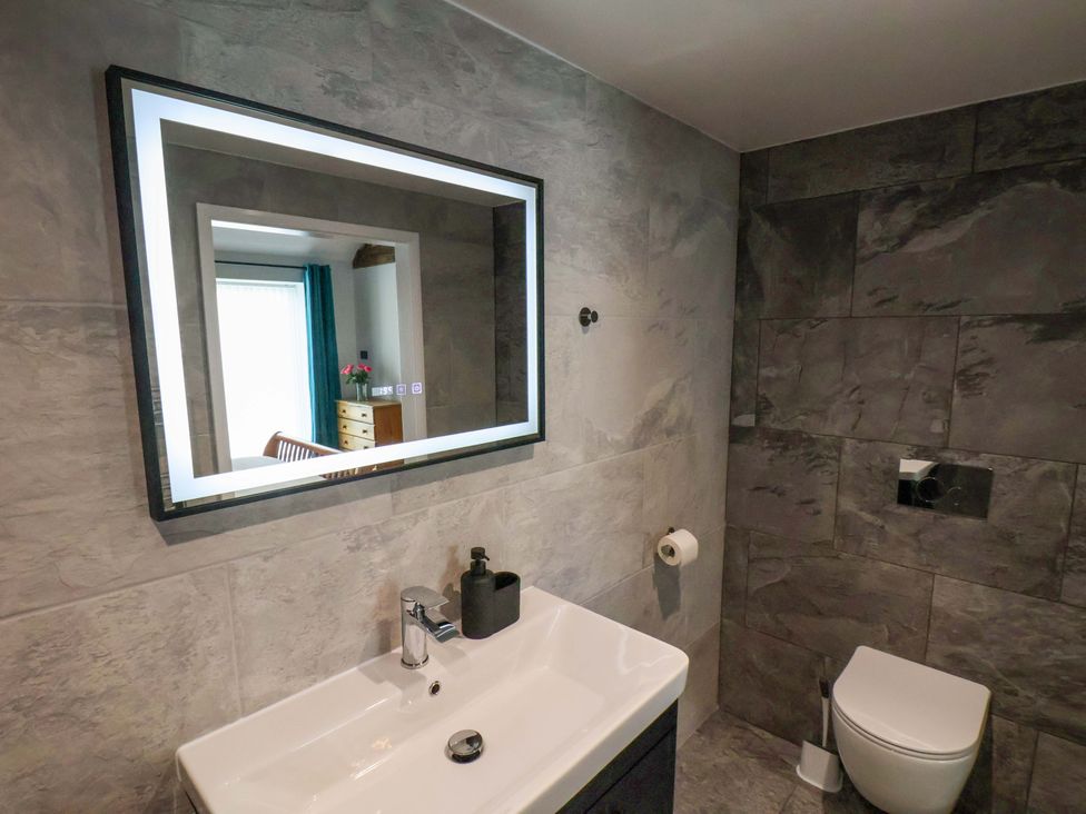 A bathroom with a sink and a toilet at The Homestead in Moorsholm