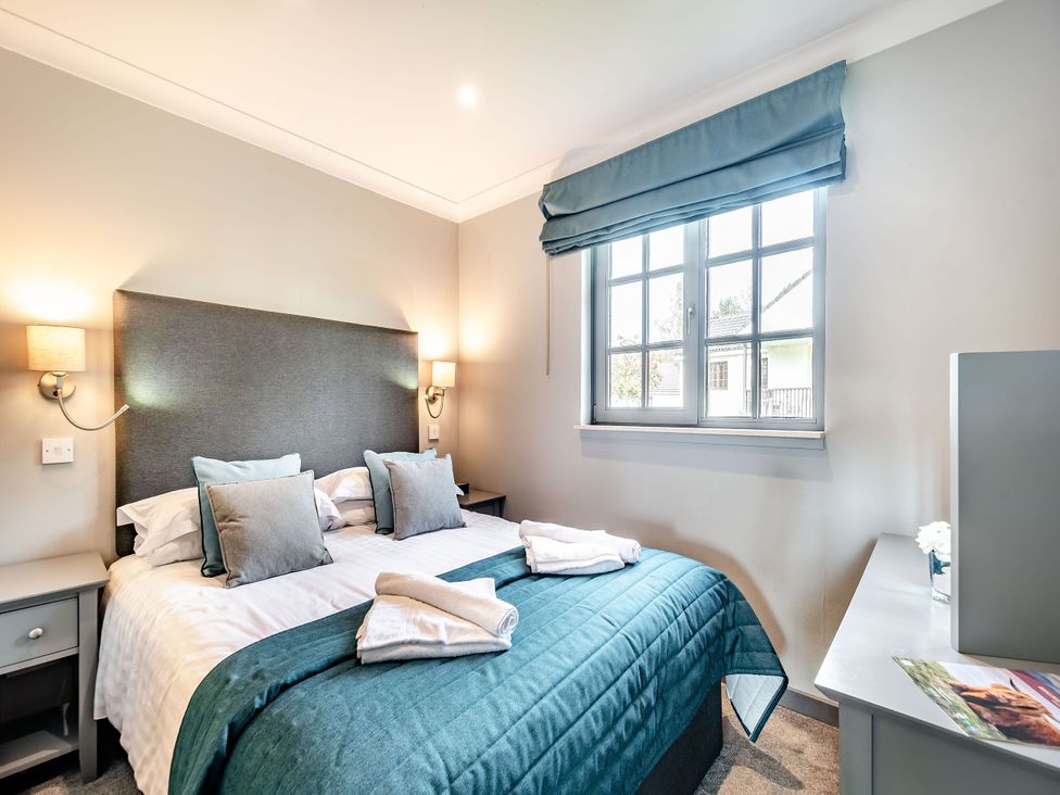 A bedroom with a bed and window at Bargany (Pet) in Dailly