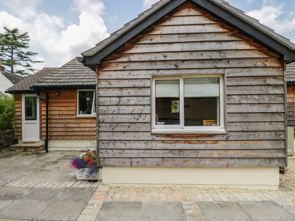 A house exterior with a window and door at Little Orchard in SwallowCliffe