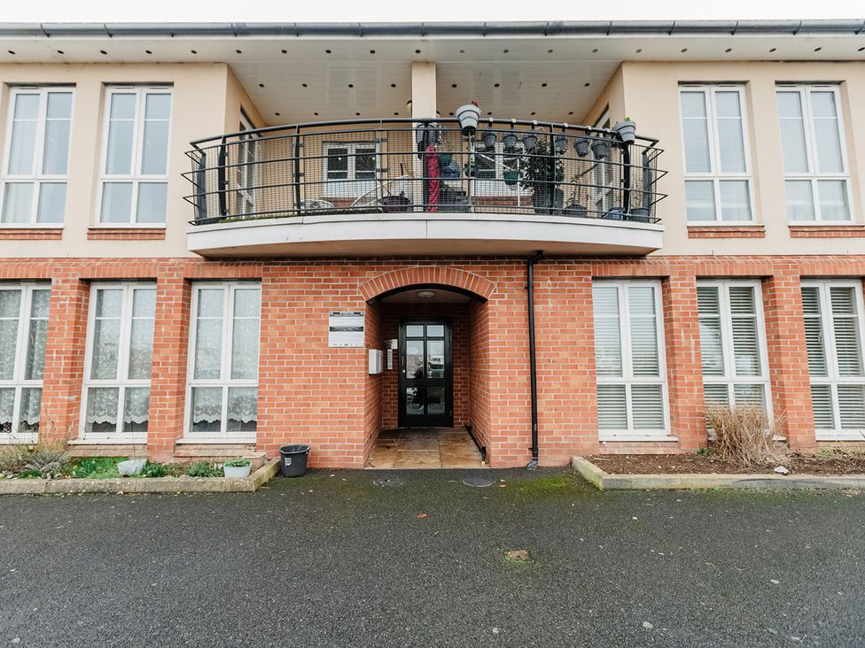 An outdoor view of a building with a balcony at 5 Mariners Wharf Newhaven