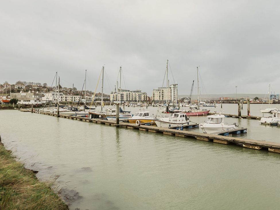 A marina with boats docked at 5 Mariners Wharf in Newhaven