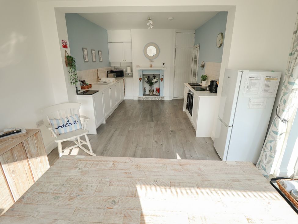 A kitchen with a fridge and stove at The Seaside Retreat in Sutton-On-Sea