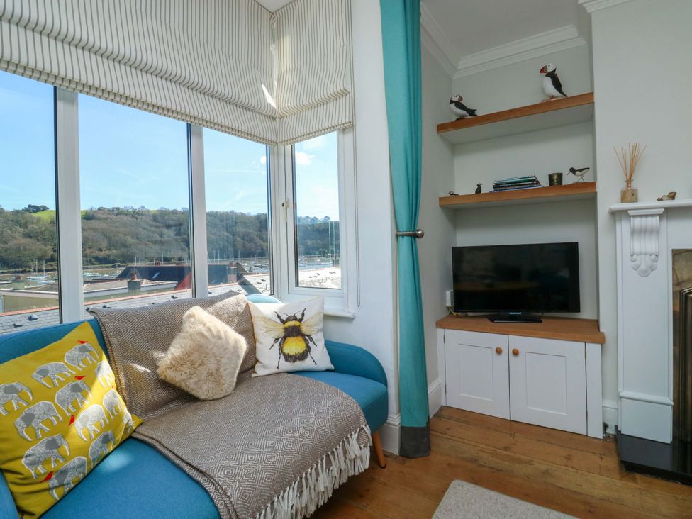 A living room with a sofa and television at 43 Sandquay Road Dartmouth