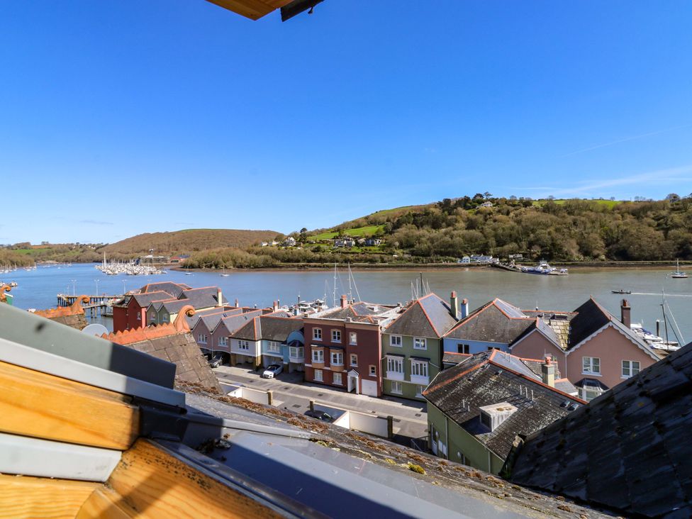 A view of rooftops and a river with boats at 43 Sandquay Road, Dartmouth