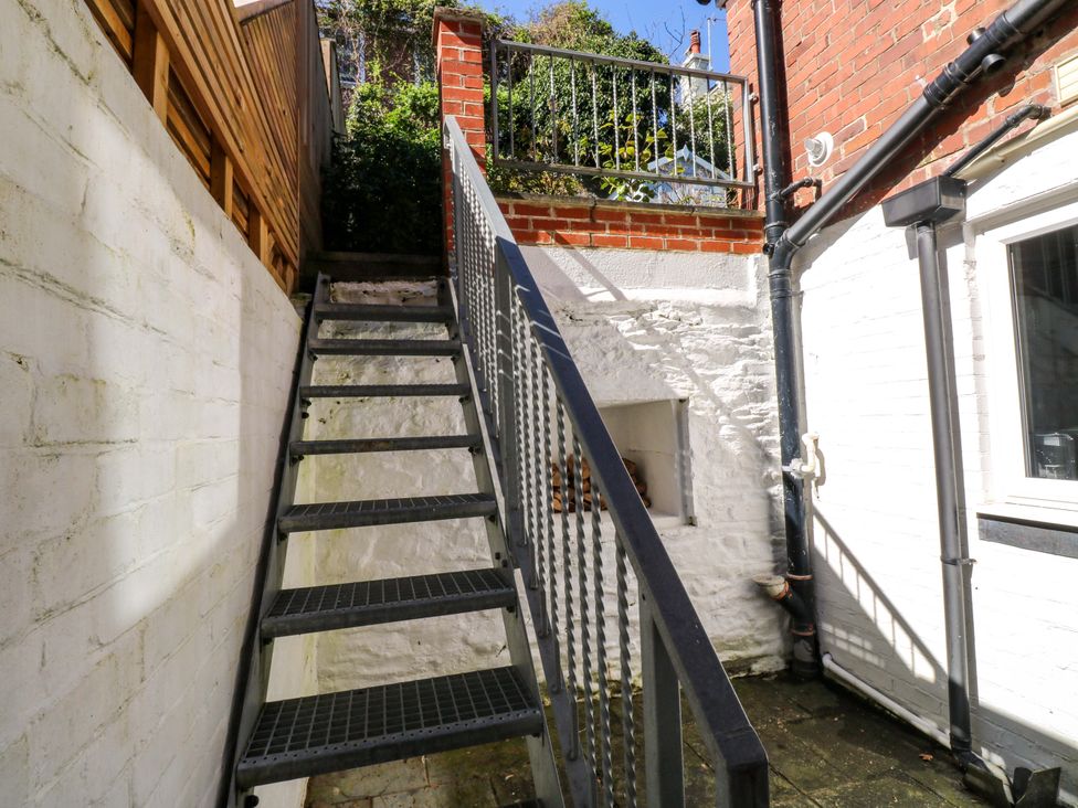 A staircase leading to a garden area at 43 Sandquay Road Dartmouth