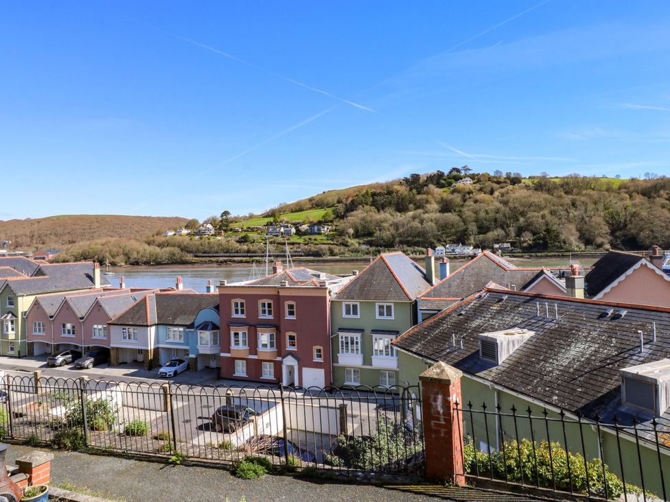 A view of houses beside a river at 43 Sandquay Road Dartmouth