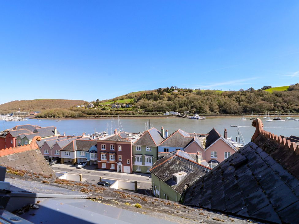 A view of rooftops and boats in the water at 43 Sandquay Road Dartmouth