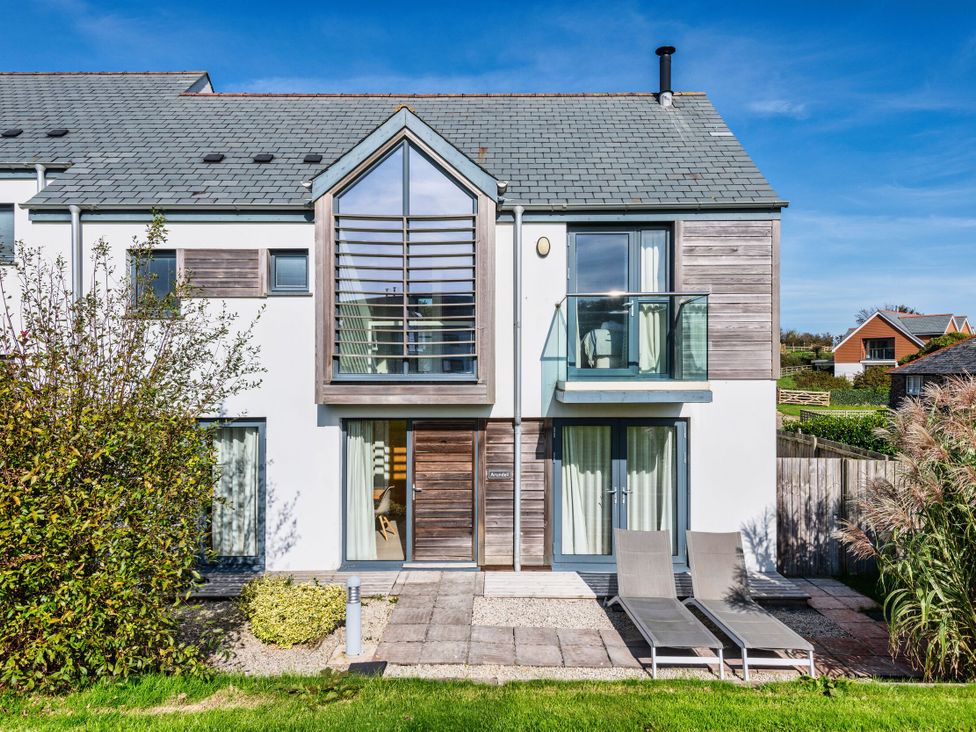 A house with balcony and patio area at Arundell in Marhamchurch
