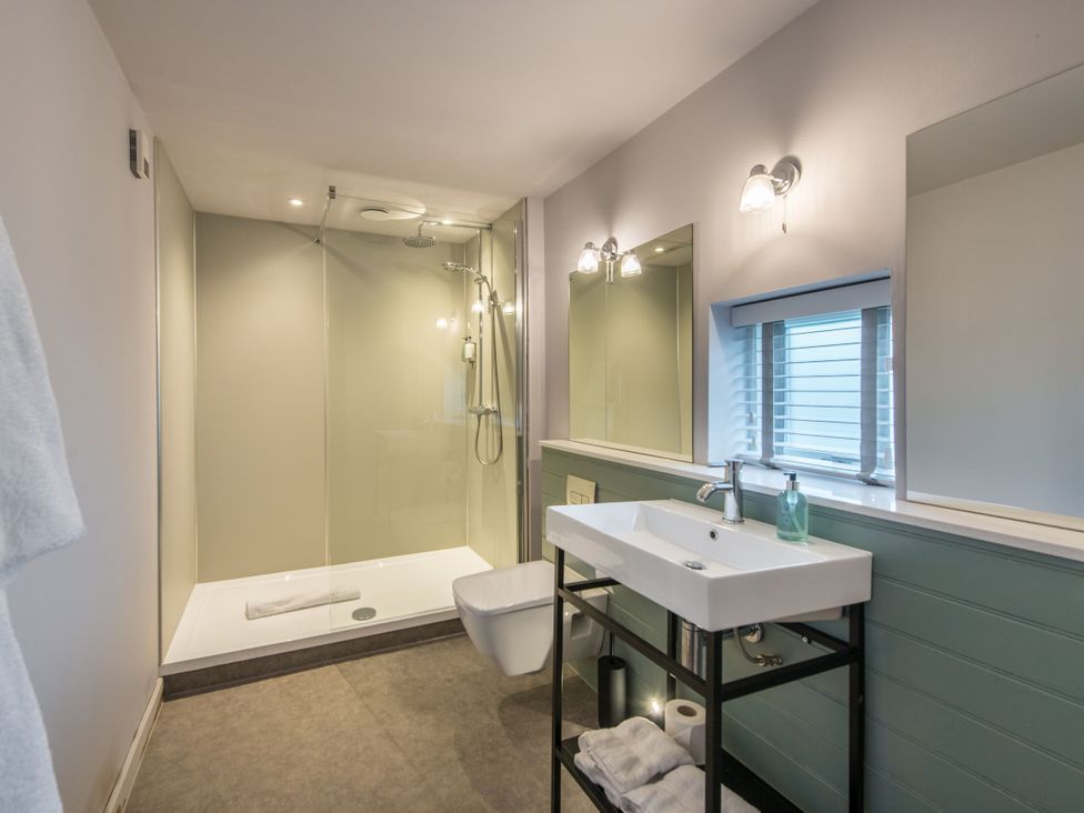 A bathroom with a shower, sink, and toilet at The Telfer in North Berwick