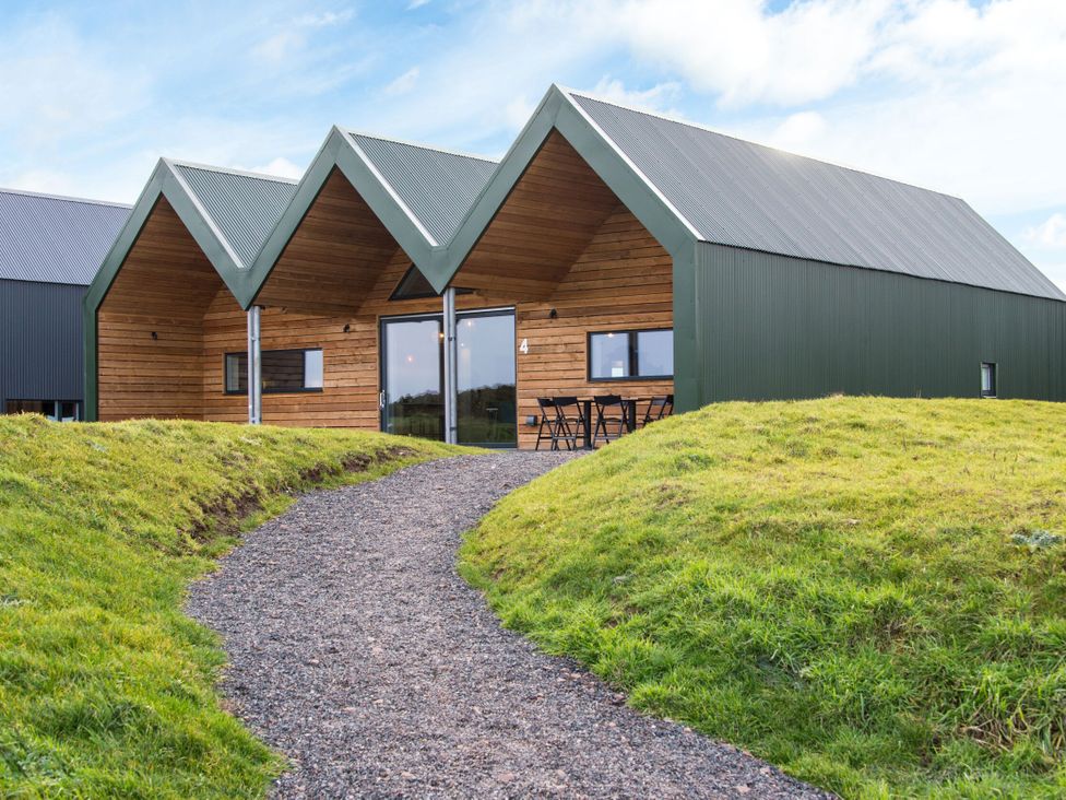 A house with a gravel path and grass area at The Irvine in North Berwick