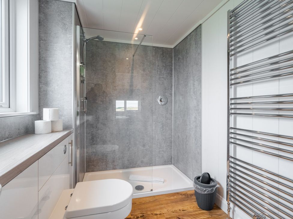 A bathroom with a shower and toilet at The Townsend in North Berwick