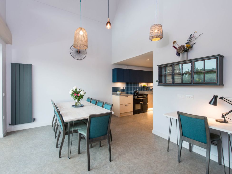 A dining room with a table and chairs at The Laidlaw Spa in North Berwick