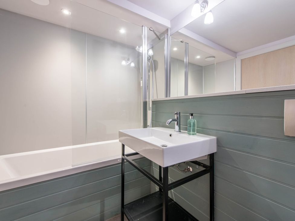 A bathroom with a sink and bathtub at The Laidlaw in North Berwick