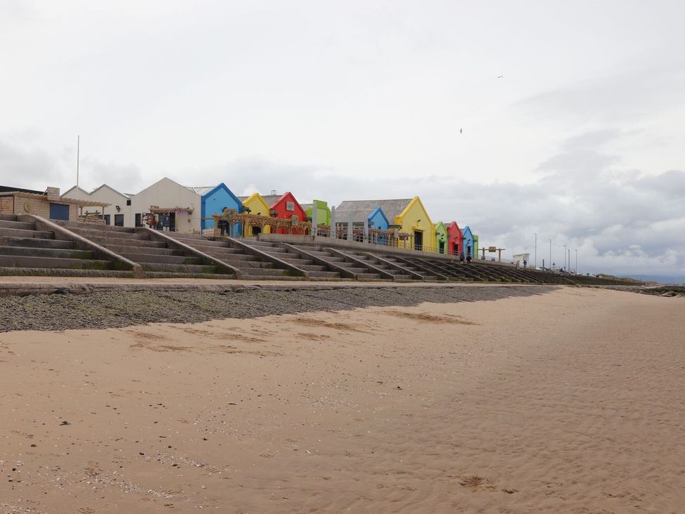 Colorful beach huts on a seaside promenade at Willerby Ellerrton (delyn)