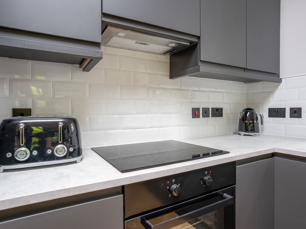 A kitchen with a toaster and kettle at Cabin 2.0 in Dumfries