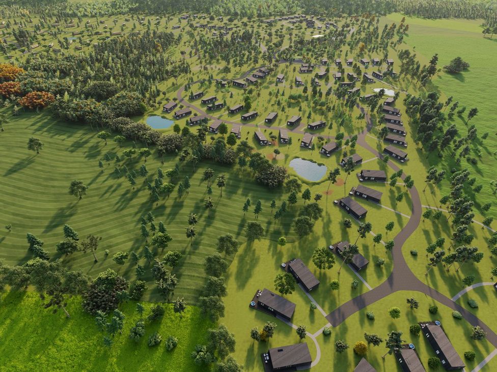 An outdoor area with cabins and trees at Cabin 2.0 in Dumfries