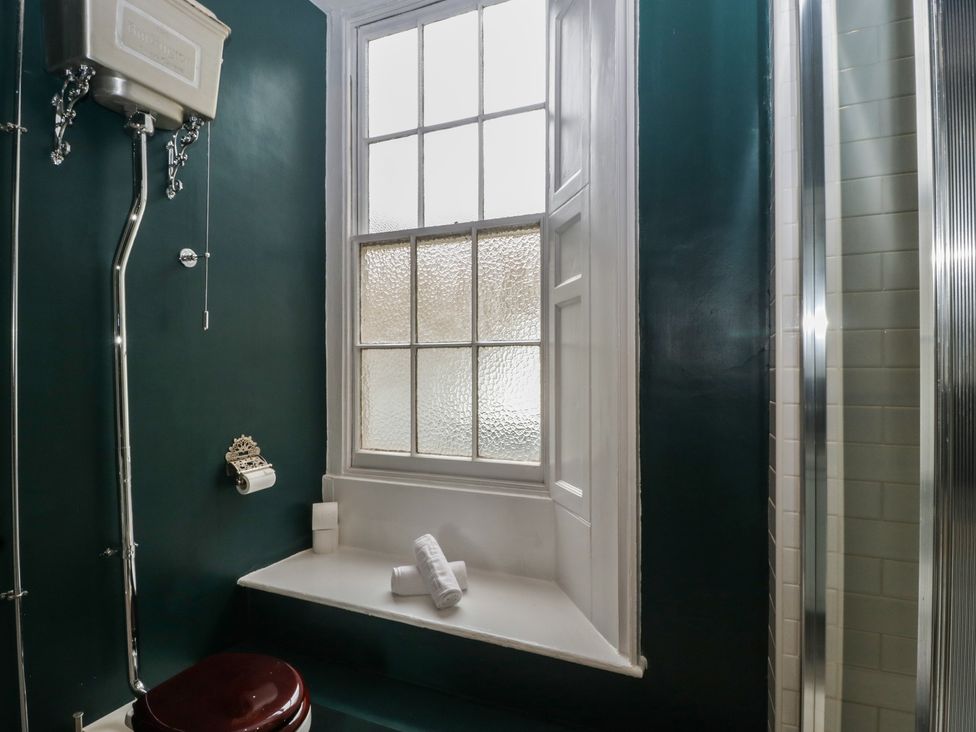 A bathroom with a toilet and shower at Frenchay Park House in Bristol