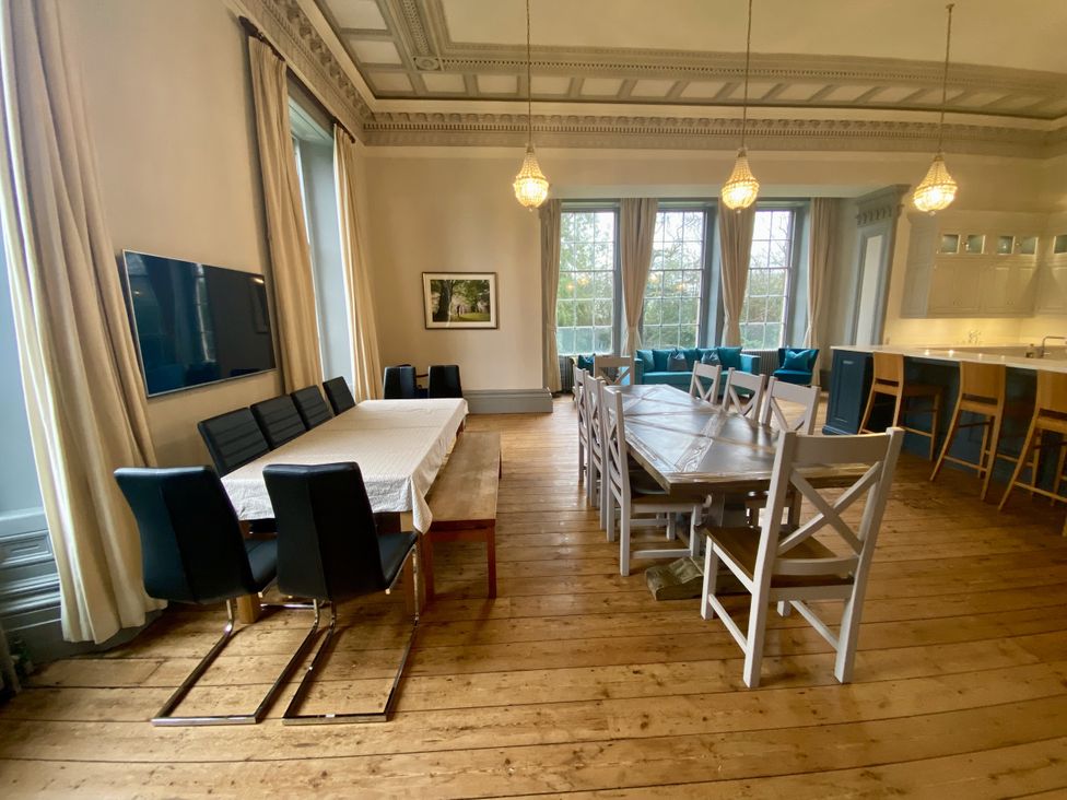 A dining room with tables and chairs at Frenchay Park House in Bristol