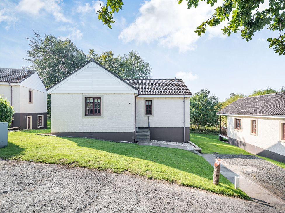 A house with garden and pathway at Ailsa Craig Spa, Dailly