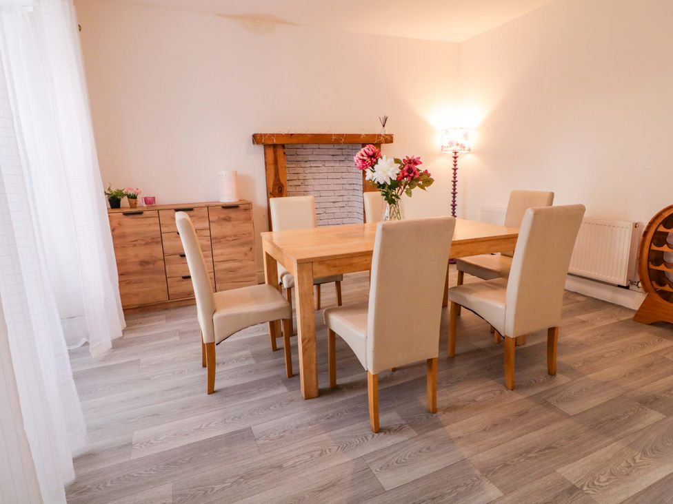 A dining room with a table and chairs at San Antonio, Dungloe, County Donegal