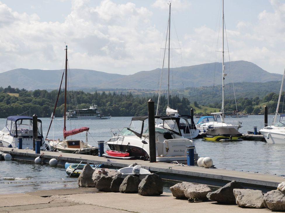 A marina with boats at Kingfisher Lodge in Windermere