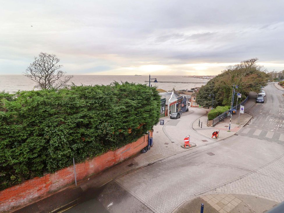 An outdoor view of a road with a sea background at Stylish Felixstowe Apartment with Fabulous Sea Views, Felixstowe, Suffolk