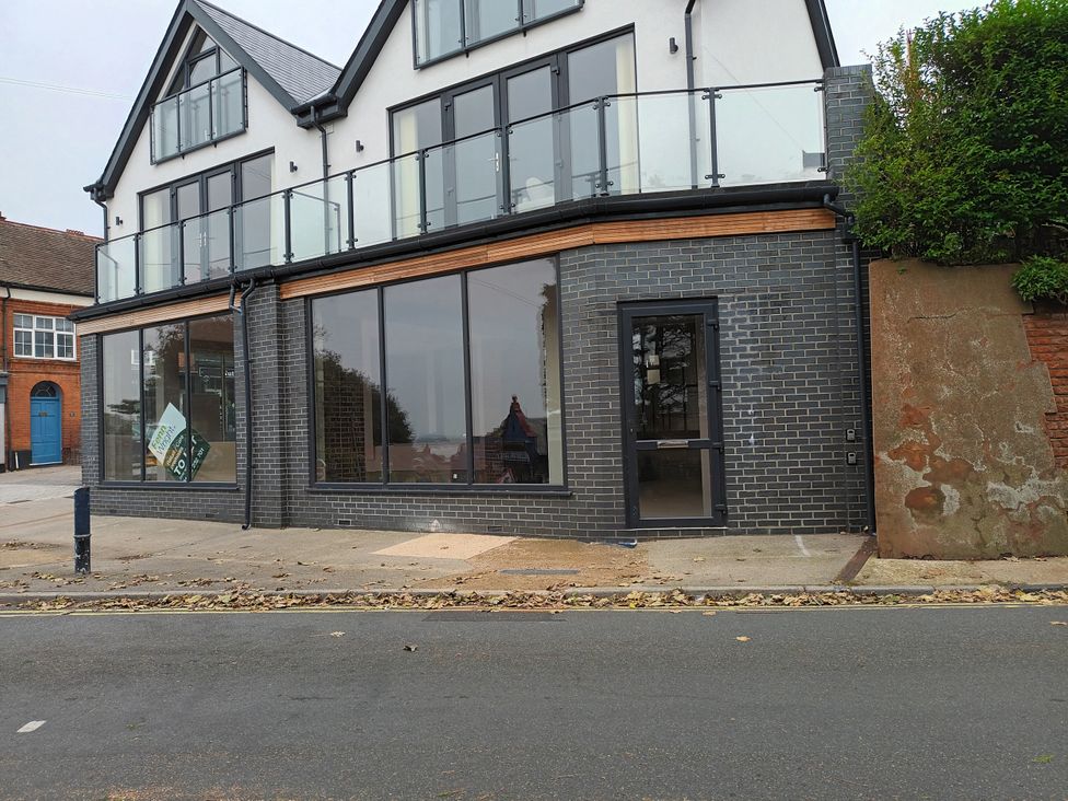 A building with large windows and balcony at 2B Hamilton Road Felixstowe