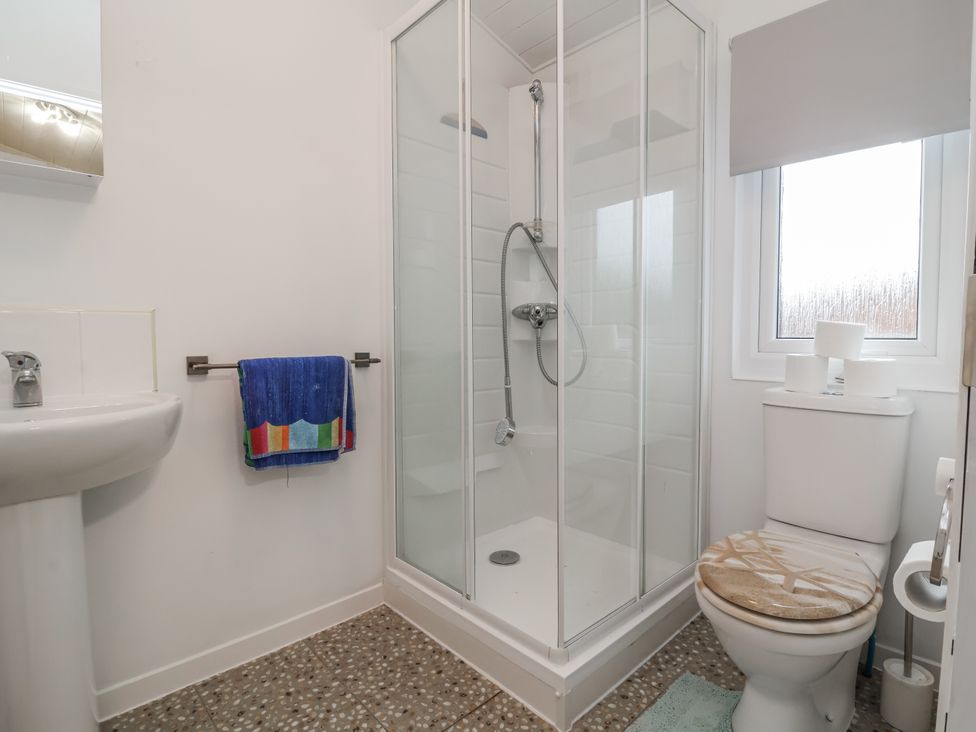 A bathroom with a shower and toilet at Ocean View in Ilfracombe