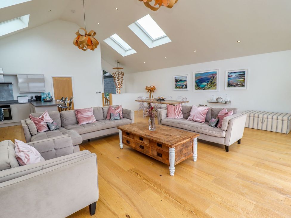 A living room with sofas and a coffee table at 2 Remera St. Ives