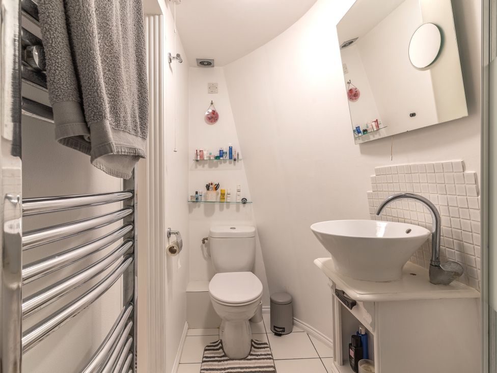 A bathroom with a sink and toilet at Hadley Park Windmill