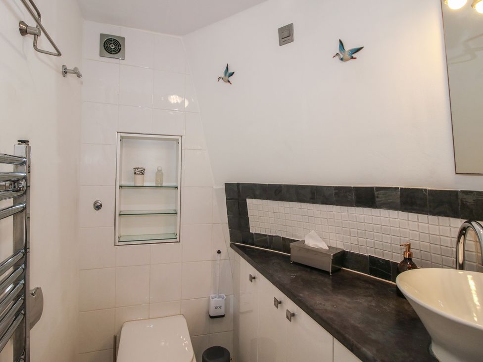 A bathroom with a sink and toilet at Hadley Park Windmill near Telford