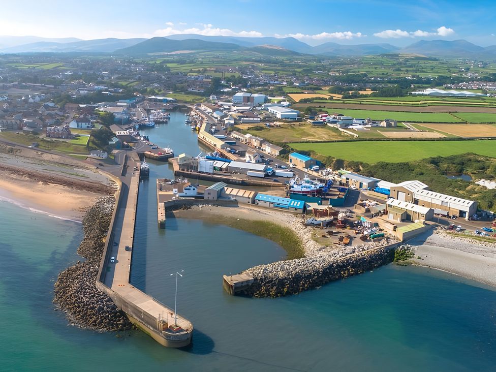 An aerial view of a harbor with boats and buildings at The Rocks in Newry