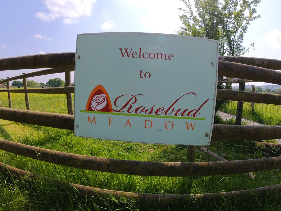 A sign indicating the entrance to Rosebud Meadow