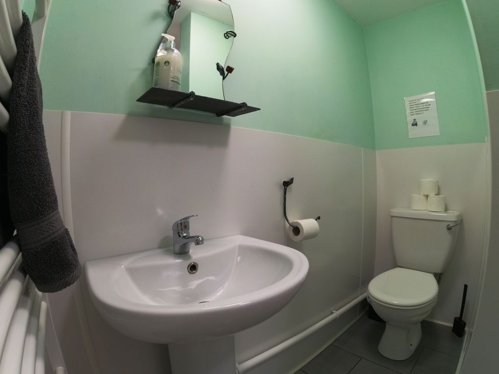 A bathroom with a sink and toilet at Rosebud Meadow Pod 2 Malvern