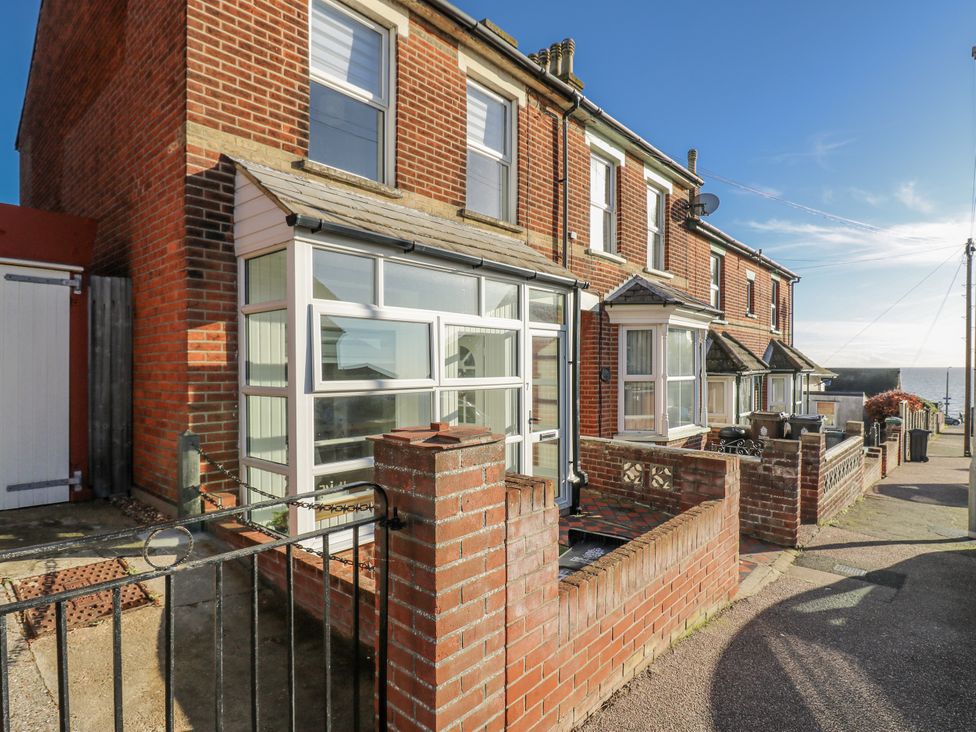A row of houses with a pathway at Beachside Terrace in Harwich