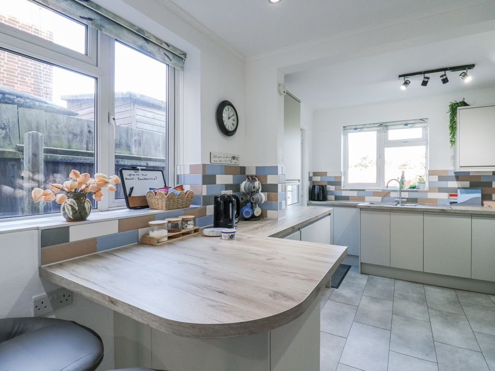 A kitchen with a countertop and sink at Beachside Terrace in Harwich