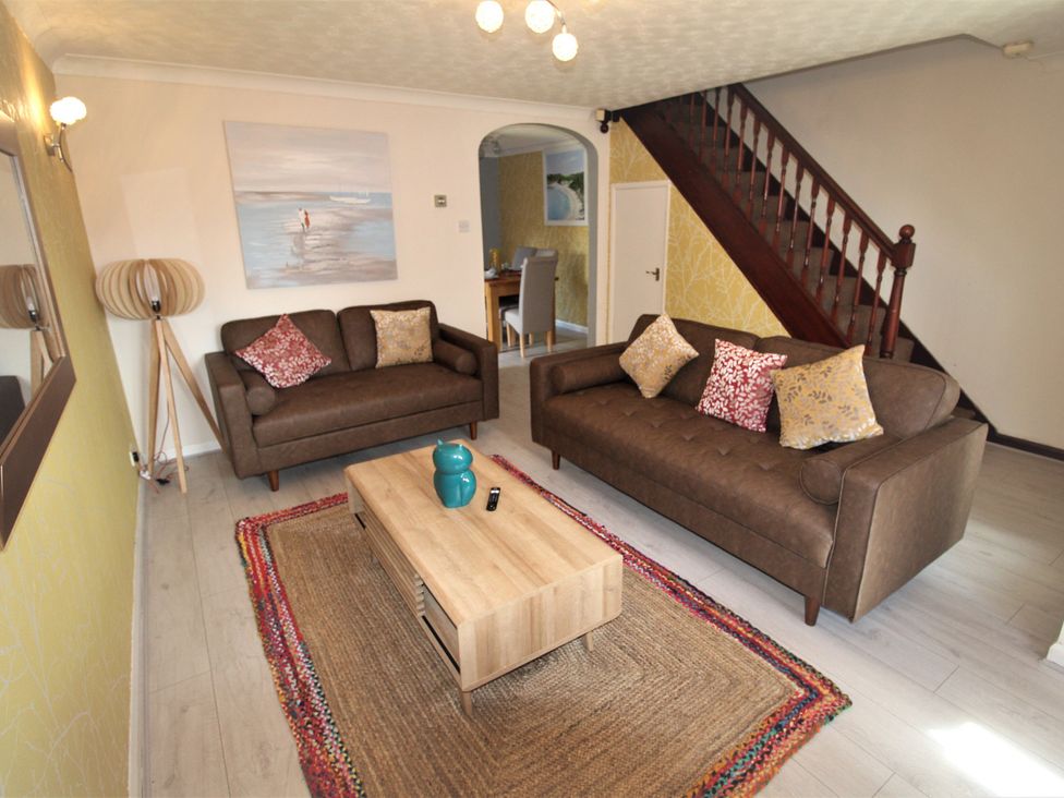 A living room with sofas and a coffee table at 41 St. Georges Road in Doncaster