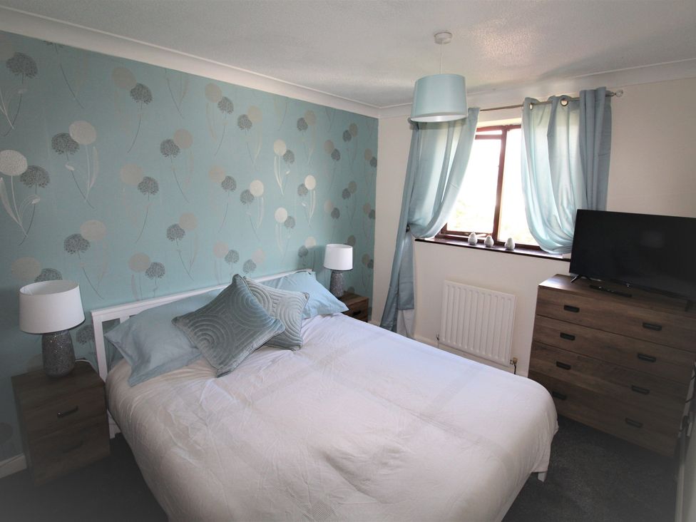 A bedroom with a bed and a television at 41 St. Georges Road Doncaster