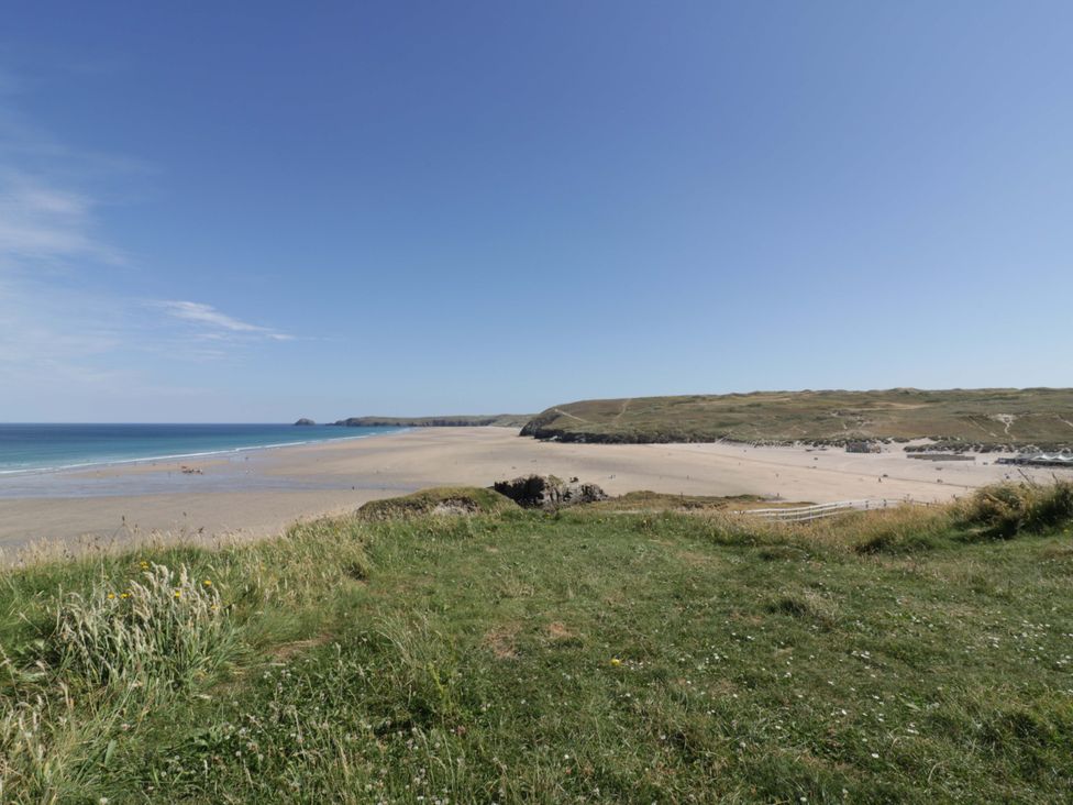 A beach with sand and ocean at Cubbs Corner in Goonbell near St Agnes