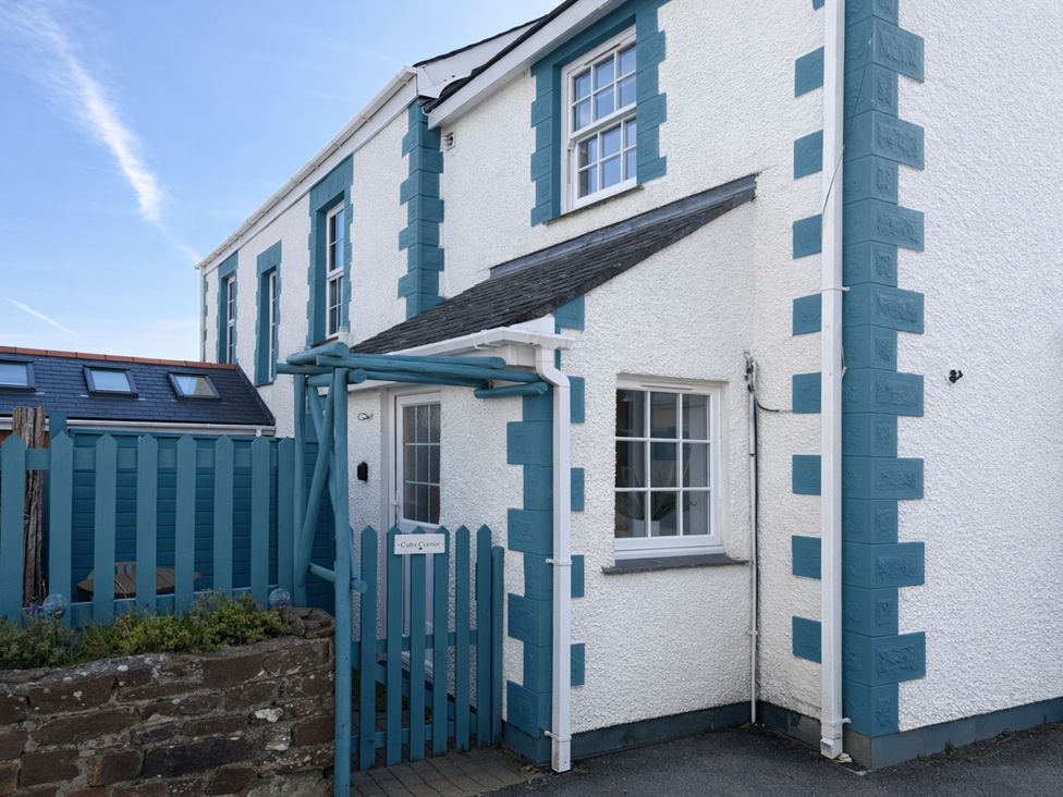 A house with a blue fence and door at Cubs Corner in St Agnes