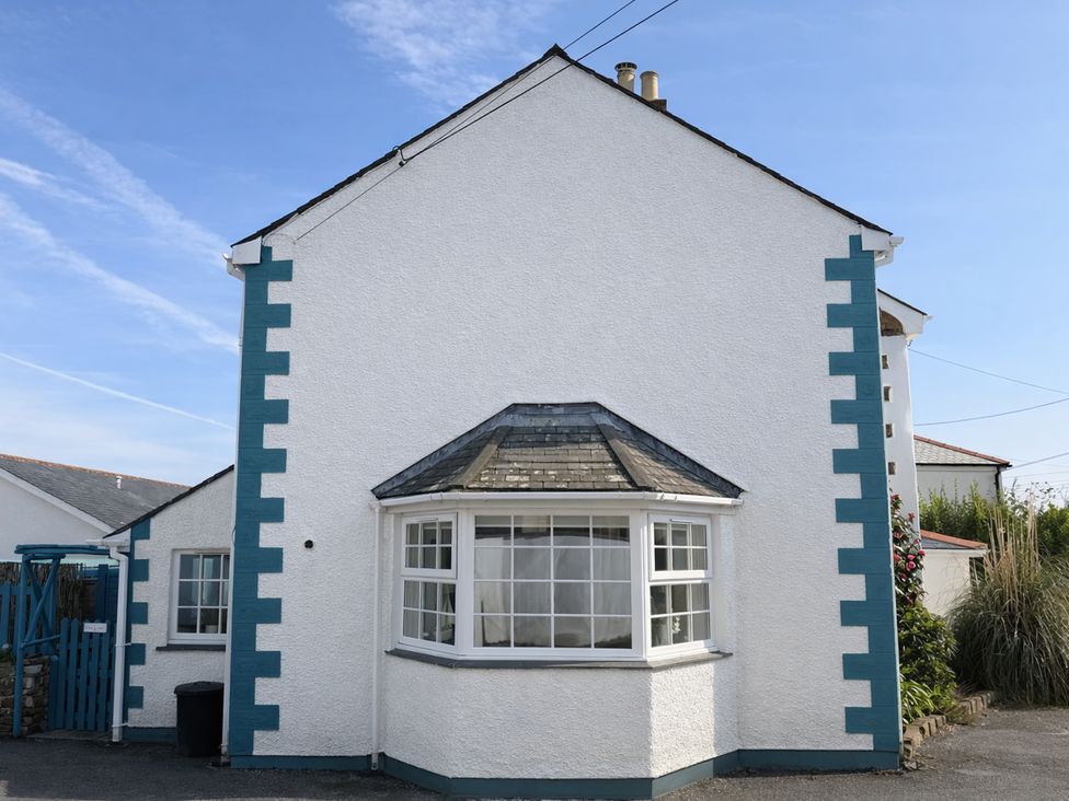 A house exterior with windows and a fence at Cubs Corner in St Agnes