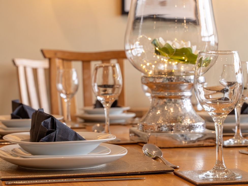 A dining room with a set table at Valley View Lodge 1 Preston