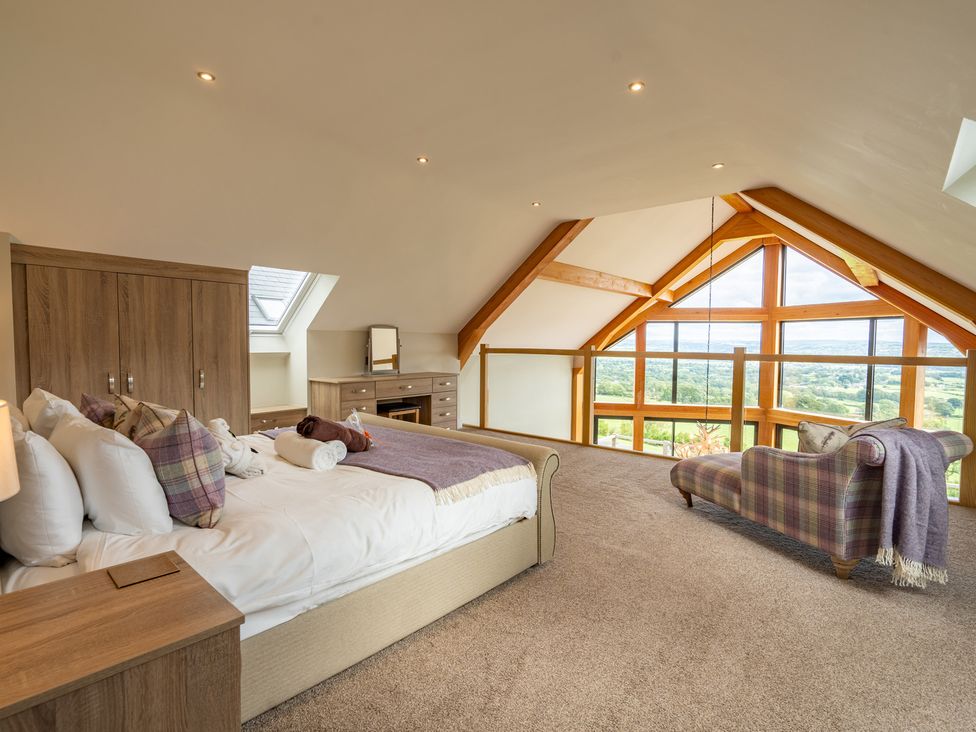 A bedroom with a bed and furniture at Valley View Lodge 1 Preston